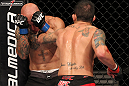 BELO HORIZONTE, BRAZIL - JUNE 23:   (R-L) Marcos Vinicius "Vina" punches Wagner "Galeto" Campos  during their UFC 147 featherweight bout at Estadio Jornalista Felipe Drummond on June 23, 2012 in Belo Horizonte, Brazil.  (Photo by Josh Hedges/Zuffa LLC/Zuffa LLC via Getty Images)