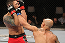 BELO HORIZONTE, BRAZIL - JUNE 23:   (R-L) Wagner "Galeto" Campos punches Marcos Vinicius "Vina" during their UFC 147 featherweight bout at Estadio Jornalista Felipe Drummond on June 23, 2012 in Belo Horizonte, Brazil.  (Photo by Josh Hedges/Zuffa LLC/Zuffa LLC via Getty Images)