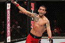 BELO HORIZONTE, BRAZIL - JUNE 23:   Marcos Vinicius "Vina" reacts after knocking out Wagner "Galeto" Campos  during their UFC 147 featherweight bout at Estadio Jornalista Felipe Drummond on June 23, 2012 in Belo Horizonte, Brazil.  (Photo by Josh Hedges/Zuffa LLC/Zuffa LLC via Getty Images)