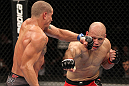 BELO HORIZONTE, BRAZIL - JUNE 23:   (L-R) Leonardo Mafra and Thiago "Bodao" Perpetuo exchange punches during their UFC 147 middleweight bout at Estadio Jornalista Felipe Drummond on June 23, 2012 in Belo Horizonte, Brazil.  (Photo by Josh Hedges/Zuffa LLC/Zuffa LLC via Getty Images)