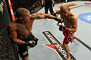 BELO HORIZONTE, BRAZIL - JUNE 23:   (L-R) Leonardo Mafra punches Thiago "Bodao" Perpetuo during their UFC 147 middleweight bout at Estadio Jornalista Felipe Drummond on June 23, 2012 in Belo Horizonte, Brazil.  (Photo by Josh Hedges/Zuffa LLC/Zuffa LLC via Getty Images)