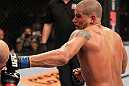BELO HORIZONTE, BRAZIL - JUNE 23:   (R-L) Leonardo Mafra punches Thiago "Bodao" Perpetuo during their UFC 147 middleweight bout at Estadio Jornalista Felipe Drummond on June 23, 2012 in Belo Horizonte, Brazil.  (Photo by Josh Hedges/Zuffa LLC/Zuffa LLC via Getty Images)