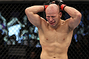 BELO HORIZONTE, BRAZIL - JUNE 23:   Thiago "Bodao" Perpetuo reacts after his TKO victory over Leonardo Mafra during their UFC 147 middleweight bout at Estadio Jornalista Felipe Drummond on June 23, 2012 in Belo Horizonte, Brazil.  (Photo by Josh Hedges/Zuffa LLC/Zuffa LLC via Getty Images)