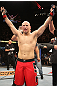 BELO HORIZONTE, BRAZIL - JUNE 23:   Thiago "Bodao" Perpetuo reacts after his TKO victory over Leonardo Mafra during their UFC 147 middleweight bout at Estadio Jornalista Felipe Drummond on June 23, 2012 in Belo Horizonte, Brazil.  (Photo by Josh Hedges/Zuffa LLC/Zuffa LLC via Getty Images)