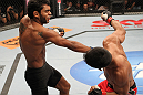 BELO HORIZONTE, BRAZIL - JUNE 23:   (L-R) Hugo "Wolverine" Viana punches John Teixeira during their UFC 147 featherweight bout at Estadio Jornalista Felipe Drummond on June 23, 2012 in Belo Horizonte, Brazil.  (Photo by Josh Hedges/Zuffa LLC/Zuffa LLC via Getty Images)