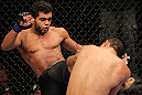 BELO HORIZONTE, BRAZIL - JUNE 23:   (L-R) Hugo "Wolverine" Viana kicks John Teixeira during their UFC 147 featherweight bout at Estadio Jornalista Felipe Drummond on June 23, 2012 in Belo Horizonte, Brazil.  (Photo by Josh Hedges/Zuffa LLC/Zuffa LLC via Getty Images)