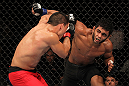 BELO HORIZONTE, BRAZIL - JUNE 23:   (R-L) Hugo "Wolverine" Viana punches John Teixeira during their UFC 147 featherweight bout at Estadio Jornalista Felipe Drummond on June 23, 2012 in Belo Horizonte, Brazil.  (Photo by Josh Hedges/Zuffa LLC/Zuffa LLC via Getty Images)