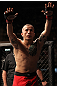 BELO HORIZONTE, BRAZIL - JUNE 23:   Anistavio "Gasparzinho" Medeiros salutes the fans before his UFC 147 bout against Rodrigo Damm at Estadio Jornalista Felipe Drummond on June 23, 2012 in Belo Horizonte, Brazil.  (Photo by Josh Hedges/Zuffa LLC/Zuffa LLC via Getty Images)