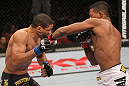 BELO HORIZONTE, BRAZIL - JUNE 23:   (R-L) Yuri Alcantara punches Hacran Dias during their UFC 147 featherweight bout at Estadio Jornalista Felipe Drummond on June 23, 2012 in Belo Horizonte, Brazil.  (Photo by Josh Hedges/Zuffa LLC/Zuffa LLC via Getty Images)