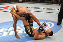 BELO HORIZONTE, BRAZIL - JUNE 23:   (L-R) Yuri Alcantara punches Hacran Dias during their UFC 147 featherweight bout at Estadio Jornalista Felipe Drummond on June 23, 2012 in Belo Horizonte, Brazil.  (Photo by Josh Hedges/Zuffa LLC/Zuffa LLC via Getty Images)