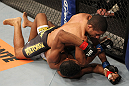 BELO HORIZONTE, BRAZIL - JUNE 23:   Hacran Dias (top) delivers an elbow against Yuri Alcantara during their UFC 147 featherweight bout at Estadio Jornalista Felipe Drummond on June 23, 2012 in Belo Horizonte, Brazil.  (Photo by Josh Hedges/Zuffa LLC/Zuffa LLC via Getty Images)