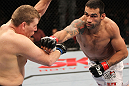 BELO HORIZONTE, BRAZIL - JUNE 23:   (R-L) Fabricio Werdum punches Mike Russow during their UFC 147 heavyweight bout at Estadio Jornalista Felipe Drummond on June 23, 2012 in Belo Horizonte, Brazil.  (Photo by Josh Hedges/Zuffa LLC/Zuffa LLC via Getty Images)