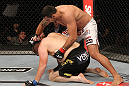 BELO HORIZONTE, BRAZIL - JUNE 23:   (R-L) Fabricio Werdum punches Mike Russow during their UFC 147 heavyweight bout at Estadio Jornalista Felipe Drummond on June 23, 2012 in Belo Horizonte, Brazil.  (Photo by Josh Hedges/Zuffa LLC/Zuffa LLC via Getty Images)