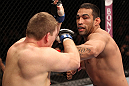 BELO HORIZONTE, BRAZIL - JUNE 23:   (R-L) Fabricio Werdum punches Mike Russow during their UFC 147 heavyweight bout at Estadio Jornalista Felipe Drummond on June 23, 2012 in Belo Horizonte, Brazil.  (Photo by Josh Hedges/Zuffa LLC/Zuffa LLC via Getty Images)