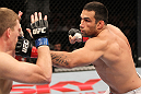 BELO HORIZONTE, BRAZIL - JUNE 23:   (R-L) Fabricio Werdum punches Mike Russow during their UFC 147 heavyweight bout at Estadio Jornalista Felipe Drummond on June 23, 2012 in Belo Horizonte, Brazil.  (Photo by Josh Hedges/Zuffa LLC/Zuffa LLC via Getty Images)