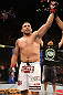 BELO HORIZONTE, BRAZIL - JUNE 23:   Fabricio Werdum reacts after defeating Mike Russow during their UFC 147 heavyweight bout at Estadio Jornalista Felipe Drummond on June 23, 2012 in Belo Horizonte, Brazil.  (Photo by Josh Hedges/Zuffa LLC/Zuffa LLC via Getty Images)