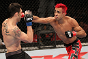 BELO HORIZONTE, BRAZIL - JUNE 23:   (R-L) Godofredo Pepey punches Rony "Jason" Mariano Bezerra during their UFC 147 featherweight bout at Estadio Jornalista Felipe Drummond on June 23, 2012 in Belo Horizonte, Brazil.  (Photo by Josh Hedges/Zuffa LLC/Zuffa LLC via Getty Images)