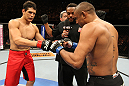 BELO HORIZONTE, BRAZIL - JUNE 23:   (L-R) Cezar "Mutante" Ferreira and Sergio "Serginho" Moraes receive final instructions from the referee before their UFC 147 middleweight bout at Est&Atilde;&iexcl;dio Jornalista Felipe Drummond on June 23, 2012 in Belo Horizonte, Brazil.  (Photo by Josh Hedges/Zuffa LLC/Zuffa LLC via Getty Images)