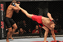 BELO HORIZONTE, BRAZIL - JUNE 23:   (R-L) Cezar "Mutante" Ferreira kicks Sergio "Serginho" Moraes during their UFC 147 middleweight bout at Est&Atilde;&iexcl;dio Jornalista Felipe Drummond on June 23, 2012 in Belo Horizonte, Brazil.  (Photo by Josh Hedges/Zuffa LLC/Zuffa LLC via Getty Images)