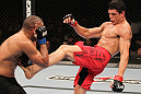 BELO HORIZONTE, BRAZIL - JUNE 23: (R-L) Cezar "Mutante" Ferreira kicks Sergio "Serginho" Moraes during their UFC 147 middleweight bout at Est&Atilde;&iexcl;dio Jornalista Felipe Drummond on June 23, 2012 in Belo Horizonte, Brazil. (Photo by Josh Hedges/Zuffa LLC/Zuffa LLC via Getty Images)