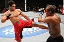 BELO HORIZONTE, BRAZIL - JUNE 23: (L-R) Cezar Ferreira kicks Sergio Moraes during their UFC 147 middleweight bout at Est&Atilde;&iexcl;dio Jornalista Felipe Drummond on June 23, 2012 in Belo Horizonte, Brazil. (Photo by Josh Hedges/Zuffa LLC/Zuffa LLC via Getty Images)