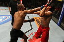 BELO HORIZONTE, BRAZIL - JUNE 23:   (L-R) Sergio "Serginho" Moraes punches Cezar "Mutante" Ferreira during their UFC 147 middleweight bout at Estadio Jornalista Felipe Drummond on June 23, 2012 in Belo Horizonte, Brazil.  (Photo by Josh Hedges/Zuffa LLC/Zuffa LLC via Getty Images)
