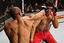 BELO HORIZONTE, BRAZIL - JUNE 23:   (L-R) Sergio "Serginho" Moraes punches Cezar "Mutante" Ferreira during their UFC 147 middleweight bout at Estadio Jornalista Felipe Drummond on June 23, 2012 in Belo Horizonte, Brazil.  (Photo by Josh Hedges/Zuffa LLC/Zuffa LLC via Getty Images)