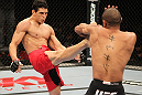 BELO HORIZONTE, BRAZIL - JUNE 23: (R-L) Cezar Ferreira kicks Sergio Moraes during their UFC 147 middleweight bout at Est&Atilde;&iexcl;dio Jornalista Felipe Drummond on June 23, 2012 in Belo Horizonte, Brazil. (Photo by Josh Hedges/Zuffa LLC/Zuffa LLC via Getty Images)