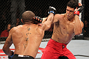 BELO HORIZONTE, BRAZIL - JUNE 23:   (L-R) Sergio "Serginho" Moraes punches Cezar "Mutante" Ferreira during their UFC 147 middleweight bout at Est&Atilde;&iexcl;dio Jornalista Felipe Drummond on June 23, 2012 in Belo Horizonte, Brazil.  (Photo by Josh Hedges/Zuffa LLC/Zuffa LLC via Getty Images)