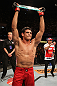 BELO HORIZONTE, BRAZIL - JUNE 23:   Cezar "Mutante" Ferreira reacts after defeating Sergio "Serginho" Moraes during their UFC 147 middleweight bout at Estadio Jornalista Felipe Drummond on June 23, 2012 in Belo Horizonte, Brazil.  (Photo by Josh Hedges/Zuffa LLC/Zuffa LLC via Getty Images)