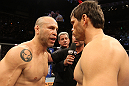 BELO HORIZONTE, BRAZIL - JUNE 23:   (L-R) Opponents Wanderlei Silva and Rich Franklin receive final instructions from the referee before their UFC 147 catchweight bout at Estadio Jornalista Felipe Drummond on June 23, 2012 in Belo Horizonte, Brazil.  (Photo by Josh Hedges/Zuffa LLC/Zuffa LLC via Getty Images)