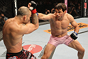 BELO HORIZONTE, BRAZIL - JUNE 23:   (R-L) Rich Franklin punches Wanderlei Silva during their UFC 147 catchweight bout at Estadio Jornalista Felipe Drummond on June 23, 2012 in Belo Horizonte, Brazil.  (Photo by Josh Hedges/Zuffa LLC/Zuffa LLC via Getty Images)