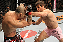 BELO HORIZONTE, BRAZIL - JUNE 23:   (R-L) Rich Franklin punches Wanderlei Silva during their UFC 147 catchweight bout at Estadio Jornalista Felipe Drummond on June 23, 2012 in Belo Horizonte, Brazil.  (Photo by Josh Hedges/Zuffa LLC/Zuffa LLC via Getty Images)