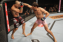 BELO HORIZONTE, BRAZIL - JUNE 23:   (R-L) Rich Franklin punches Wanderlei Silva during their UFC 147 catchweight bout at Estadio Jornalista Felipe Drummond on June 23, 2012 in Belo Horizonte, Brazil.  (Photo by Josh Hedges/Zuffa LLC/Zuffa LLC via Getty Images)