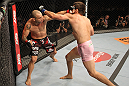 BELO HORIZONTE, BRAZIL - JUNE 23:   (L-R) Wanderlei Silva and Rich Franklin exchange punches during their UFC 147 catchweight bout at Estadio Jornalista Felipe Drummond on June 23, 2012 in Belo Horizonte, Brazil.  (Photo by Josh Hedges/Zuffa LLC/Zuffa LLC via Getty Images)