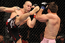 BELO HORIZONTE, BRAZIL - JUNE 23:   (L-R) Wanderlei Silva kicks Rich Franklin during their UFC 147 catchweight bout at Estadio Jornalista Felipe Drummond on June 23, 2012 in Belo Horizonte, Brazil.  (Photo by Josh Hedges/Zuffa LLC/Zuffa LLC via Getty Images)