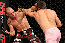 BELO HORIZONTE, BRAZIL - JUNE 23:   (R-L) Rich Franklin punches Wanderlei Silva during their UFC 147 catchweight bout at Estadio Jornalista Felipe Drummond on June 23, 2012 in Belo Horizonte, Brazil.  (Photo by Josh Hedges/Zuffa LLC/Zuffa LLC via Getty Images)