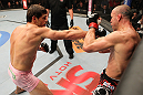 BELO HORIZONTE, BRAZIL - JUNE 23:   (L-R) Rich Franklin punches Wanderlei Silva during their UFC 147 catchweight bout at Estadio Jornalista Felipe Drummond on June 23, 2012 in Belo Horizonte, Brazil.  (Photo by Josh Hedges/Zuffa LLC/Zuffa LLC via Getty Images)