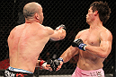 BELO HORIZONTE, BRAZIL - JUNE 23:   (L-R) Wanderlei Silva punches Rich Franklin during their UFC 147 catchweight bout at Estadio Jornalista Felipe Drummond on June 23, 2012 in Belo Horizonte, Brazil.  (Photo by Josh Hedges/Zuffa LLC/Zuffa LLC via Getty Images)