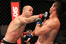 BELO HORIZONTE, BRAZIL - JUNE 23:   (L-R) Wanderlei Silva lands a punch that drops Rich Franklin during their UFC 147 catchweight bout at Estadio Jornalista Felipe Drummond on June 23, 2012 in Belo Horizonte, Brazil.  (Photo by Josh Hedges/Zuffa LLC/Zuffa LLC via Getty Images)