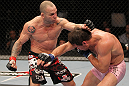 BELO HORIZONTE, BRAZIL - JUNE 23:   (L-R) Wanderlei Silva punches Rich Franklin during their UFC 147 catchweight bout at Estadio Jornalista Felipe Drummond on June 23, 2012 in Belo Horizonte, Brazil.  (Photo by Josh Hedges/Zuffa LLC/Zuffa LLC via Getty Images)