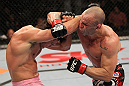 BELO HORIZONTE, BRAZIL - JUNE 23:   (R-L) Wanderlei Silva punches Rich Franklin during their UFC 147 catchweight bout at Estadio Jornalista Felipe Drummond on June 23, 2012 in Belo Horizonte, Brazil.  (Photo by Josh Hedges/Zuffa LLC/Zuffa LLC via Getty Images)