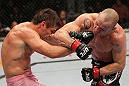BELO HORIZONTE, BRAZIL - JUNE 23:   (R-L) Wanderlei Silva punches Rich Franklin during their UFC 147 catchweight bout at Estadio Jornalista Felipe Drummond on June 23, 2012 in Belo Horizonte, Brazil.  (Photo by Josh Hedges/Zuffa LLC/Zuffa LLC via Getty Images)
