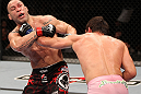 BELO HORIZONTE, BRAZIL - JUNE 23:   (R-L) Rich Franklin punches Wanderlei Silva during their UFC 147 catchweight bout at Estadio Jornalista Felipe Drummond on June 23, 2012 in Belo Horizonte, Brazil.  (Photo by Josh Hedges/Zuffa LLC/Zuffa LLC via Getty Images)