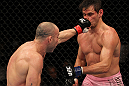 BELO HORIZONTE, BRAZIL - JUNE 23:   (L-R) Wanderlei Silva punches Rich Franklin during their UFC 147 catchweight bout at Estadio Jornalista Felipe Drummond on June 23, 2012 in Belo Horizonte, Brazil.  (Photo by Josh Hedges/Zuffa LLC/Zuffa LLC via Getty Images)