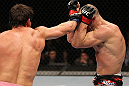 BELO HORIZONTE, BRAZIL - JUNE 23:   (L-R) Rich Franklin punches Wanderlei Silva during their UFC 147 catchweight bout at Estadio Jornalista Felipe Drummond on June 23, 2012 in Belo Horizonte, Brazil.  (Photo by Josh Hedges/Zuffa LLC/Zuffa LLC via Getty Images)