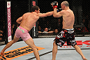 BELO HORIZONTE, BRAZIL - JUNE 23:   (L-R) Rich Franklin punches Wanderlei Silva during their UFC 147 catchweight bout at Estadio Jornalista Felipe Drummond on June 23, 2012 in Belo Horizonte, Brazil.  (Photo by Josh Hedges/Zuffa LLC/Zuffa LLC via Getty Images)