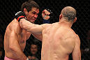 BELO HORIZONTE, BRAZIL - JUNE 23:   (R-L) Wanderlei Silva punches Rich Franklin during their UFC 147 catchweight bout at Estadio Jornalista Felipe Drummond on June 23, 2012 in Belo Horizonte, Brazil.  (Photo by Josh Hedges/Zuffa LLC/Zuffa LLC via Getty Images)