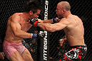 BELO HORIZONTE, BRAZIL - JUNE 23:  (R-L) Wanderlei Silva and Rich Franklin trade punches during their UFC 147 catchweight bout at Estadio Jornalista Felipe Drummond on June 23, 2012 in Belo Horizonte, Brazil.  (Photo by Josh Hedges/Zuffa LLC/Zuffa LLC via Getty Images)