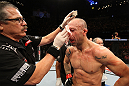 BELO HORIZONTE, BRAZIL - JUNE 23:   Wanderlei Silva receives treatment from cutman Jacob "Stitch" Duran after his five-round battle against Rich Franklin during UFC 147 at Estadio Jornalista Felipe Drummond on June 23, 2012 in Belo Horizonte, Brazil.  (Photo by Josh Hedges/Zuffa LLC/Zuffa LLC via Getty Images)